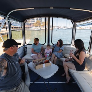 Enjoying snacks and drinks on boat hire Mandurah